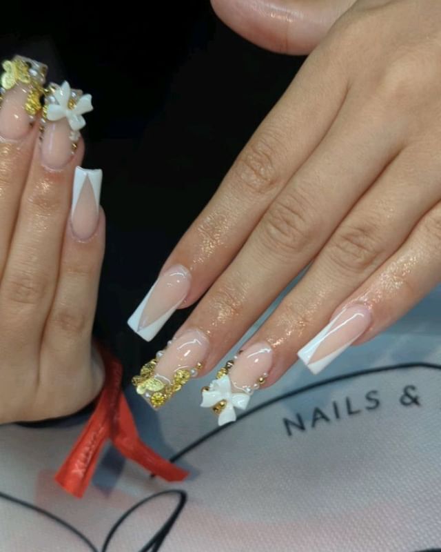 Chic French Tips with Gold Accents