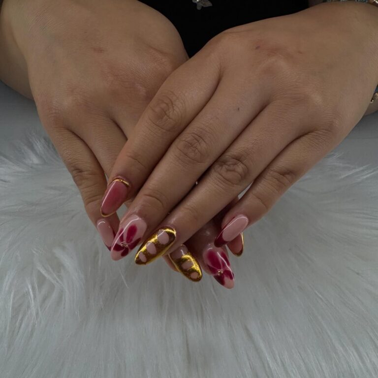 Luxurious Pink and Gold Almond Nails