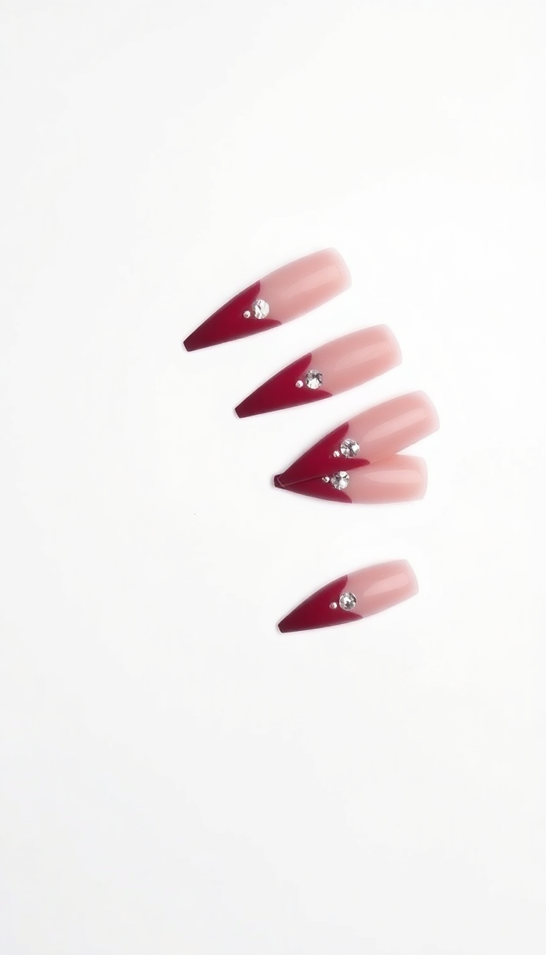 11. Burgundy Stiletto Nails with Rhinestones